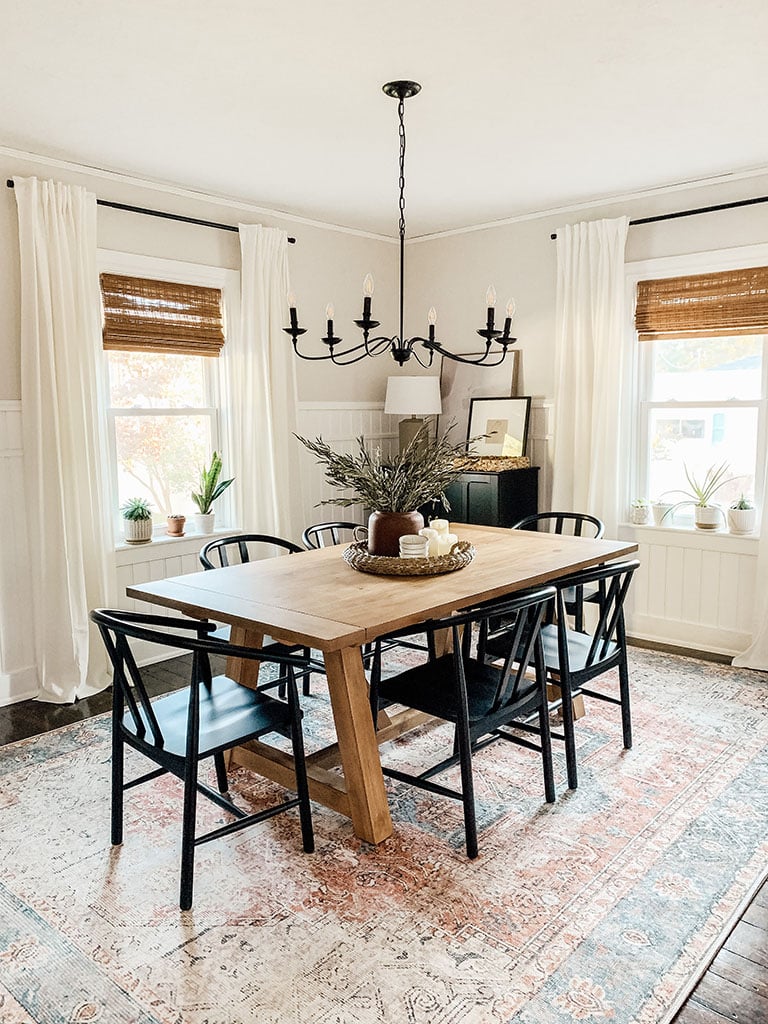 farmhouse table with black chairs
